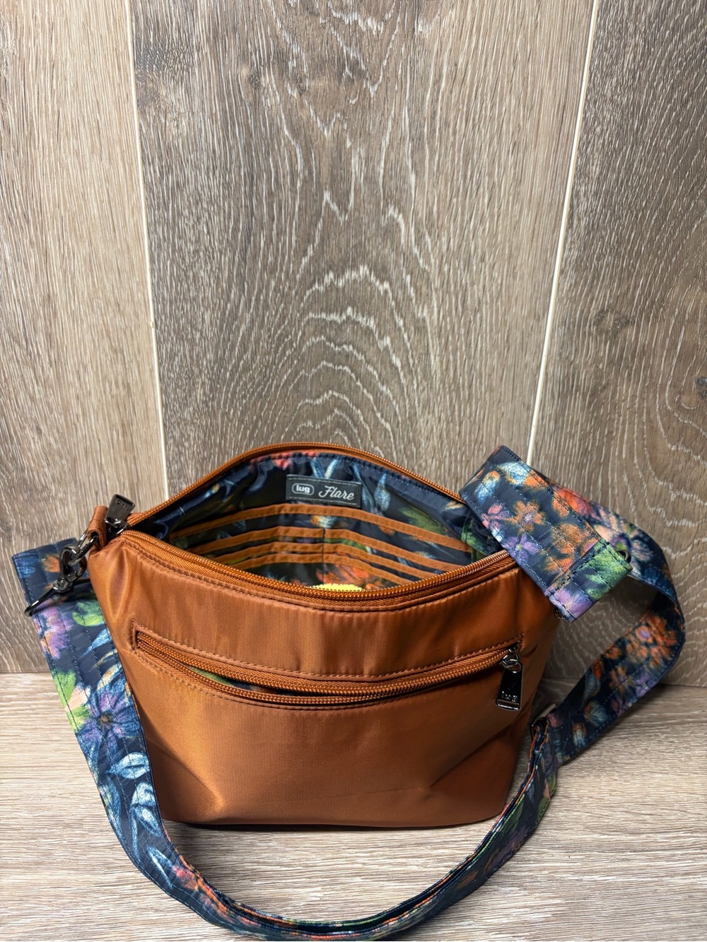 LUG flair Zip-Top Crossbody Bag in Rust with Floral Strap